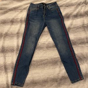 Buffalo David Bitton jeans with red stripe and studs. Size 27